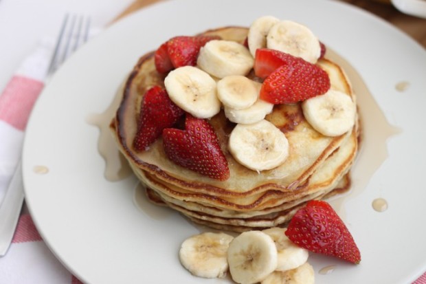 Buttermilk Pancakes with strawberries, bananas and maple syrup!